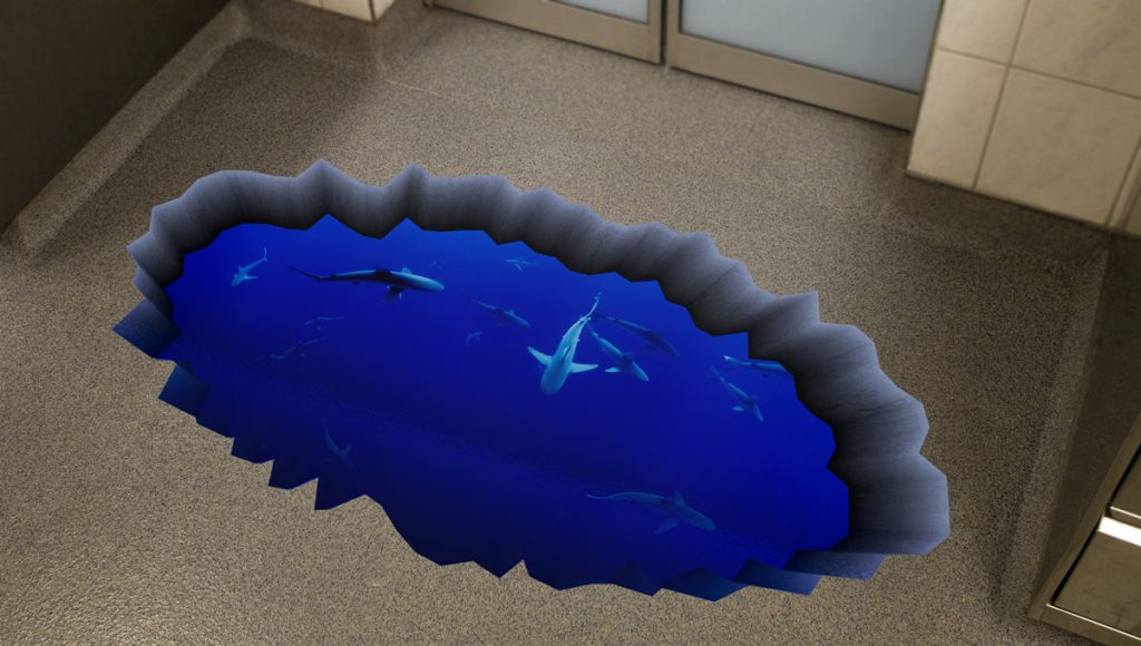 Floor graphic of sharks swimming under water in the ocean